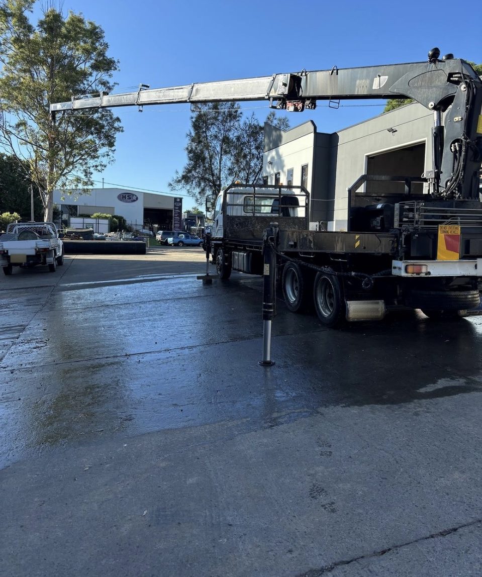 Crane truck with boom fully extended